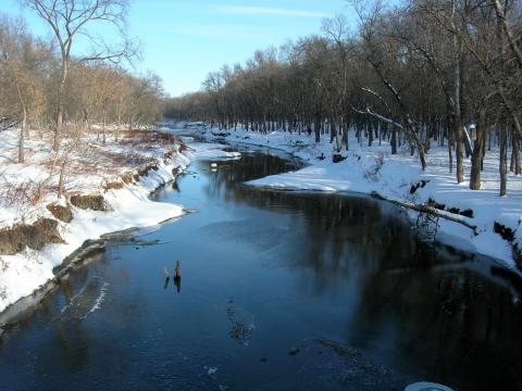 Image of the Souris River during the winter with snow-covered banks