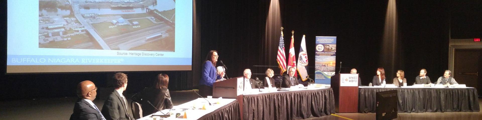 Image of head table during a presentation at the TAP Public Meeting in Buffalo, NY